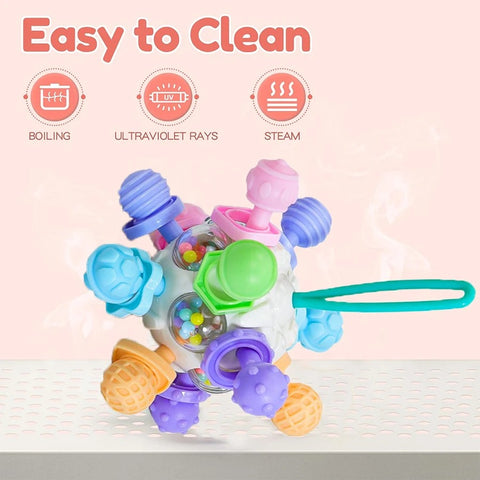 Rotating Rattle Ball Grasping Activity